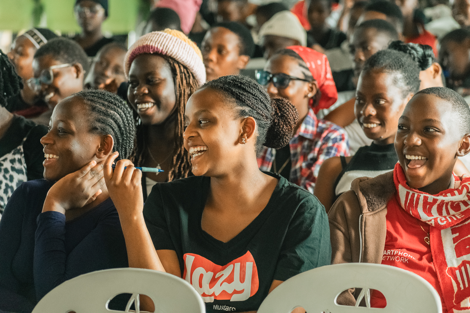 Community members engaged during SRHR outreach — Held at Heart Uganda.